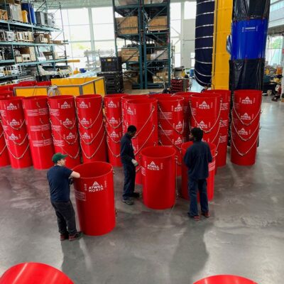 Red Superchutes being prepared for shipping. Red Superchutes being prepared for shipping.
